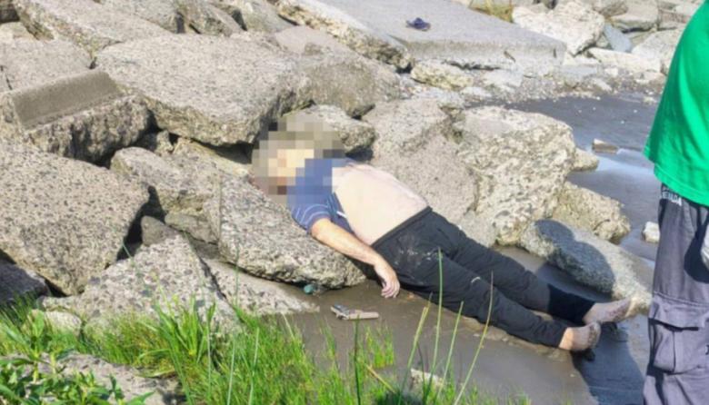 Giro en la causa del ex funcionario hallado en Punta Lara: la bala en la cabeza no lo mató